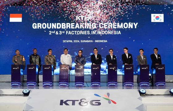 KT&G’s new CEO Bang Kyung-man, fifth from the right, and other officials pose at the groundbreaking ceremony for the company's second and third factories in Indonesia on Friday. [KT&G]