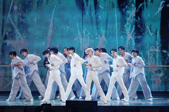The performance unit of Seventeen perform at the boy band's ″'Follow Again' in Seoul' encore concert held Saturday at the Seoul World Cup Stadium in Mapo District, western Seoul [PLEDIS ENTERTAINMENT]