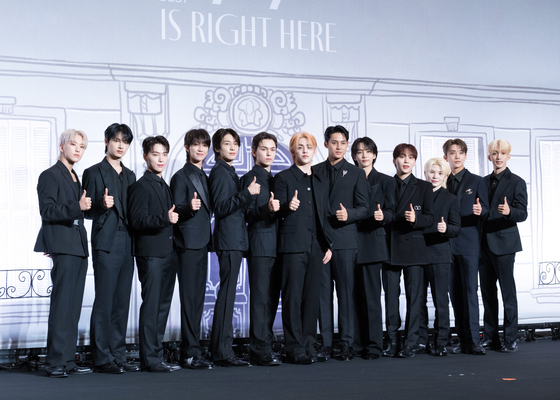 Seventeen poses for the camera during a press conference for the boy band's first compilation album ″17 is Right Here,″ held at the Conrad Seoul hotel in Yeongdeungpo District, western Seoul ahead of its 6 p.m. release. [DANIELA GONZALEZ PEREZ]