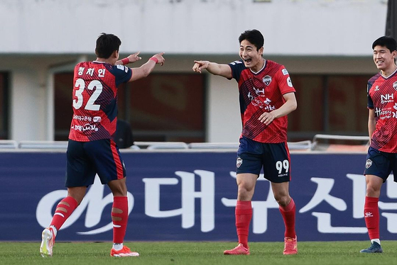 Gimcheon Sangmu forward Lee Jung-min, center, celebrates scoring during a K League 1 match against Gangwon FC at Gimcheon Sports Complex in Gimcheon, North Gyeongsang in a photo shared on Gimcheon Sangmu's official Instagram account on Saturday. [SCREEN CAPTURE]