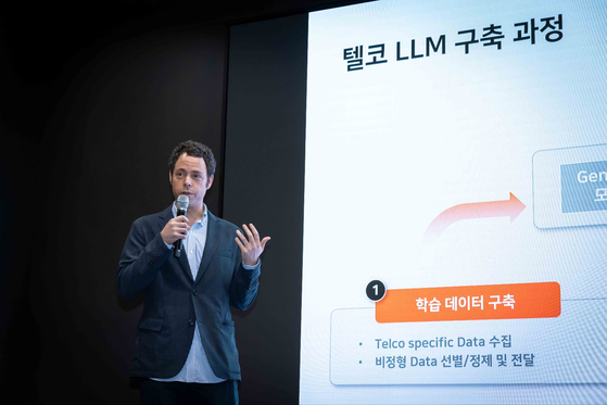 Eric Davis, vice president of SK Telecom’s AI Tech Collaboration division, explains the company's telecom-tailored large language models at the company's headquarters in central Seoul on Tuesday. [SK TELECOM]