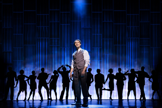 A scene from the ongoing Broadway musical "The Great Gatsby" produced by OD Company, at Broadway Theater, New York, starring Noah J. Ricketts as Nick Carraway [OD COMPANY]