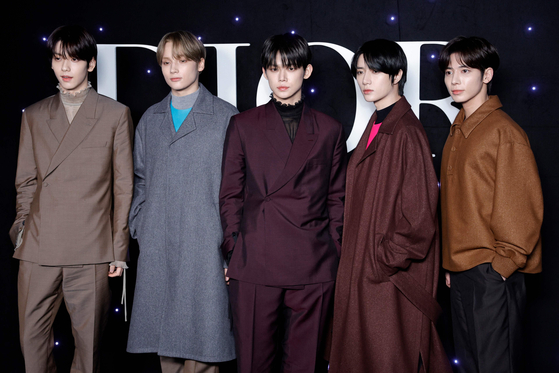 Boy band Tomorrow X Together at the Dior Homme Menswear Ready-to-wear Fall-Winter 2024/2025 collection on Jan. 19 [AFP/YONHAP]