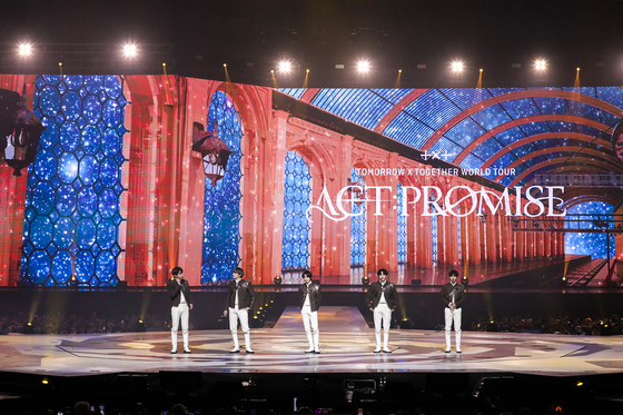 Tomorrow X Together performs during its ″Act: Promise″ world tour concert held Friday at the KSPO Dome in Songpa District, southern Seoul. [BIGHIT MUSIC]