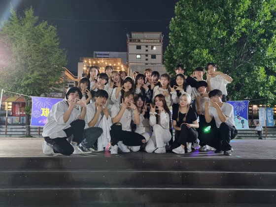 UCDC, Pusan National University's student dance club, pose for a photo after holding a performance in Seomyeon in Busanjin District, Busan, last year. [CHANNEL PNU]