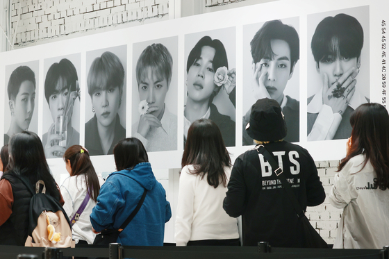 ARMY members wait in line to visit BTS's pop-up store ″Monochrome,″ currently located in Seongdong District, eastern Seoul, through May 12.