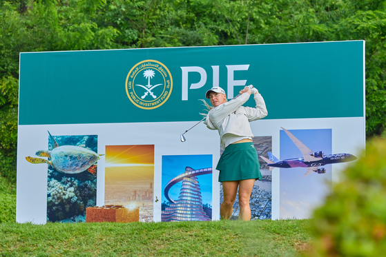 Charley Hull hits a shot during the Aramco Team Series at the New Korea Country Club in Goyang, Gyeonggi on Sunday. [ARAMCO TEAM SERIES]