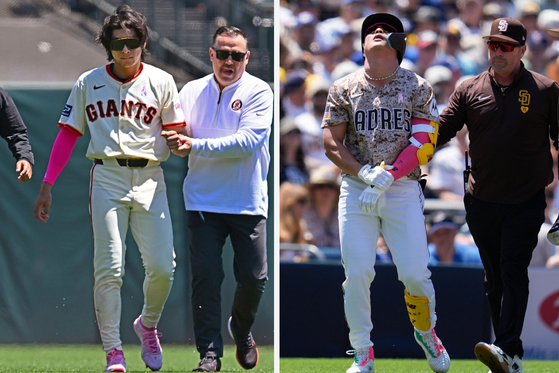 Left: San Francisco Giants' Lee Jung-hoo is escorted to the locker room after an injury in the first inning of a game against the Cincinnati Reds in San Francisco on Sunday. Right: San Diego Padres' Kim Ha-seong holds his wrist after being hit by a pitch during the fourth inning of a game against the Los Angeles Dodgers in San Diego on Sunday.  [AP/YONHAP]