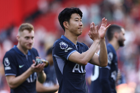 Tottenham Hotspur's Son Heung-Min greets fans following the match against Sheffield United at Bramall Lane in Sheffield, England on Sunday. [AFP/YONHAP]