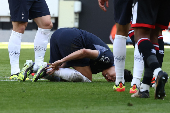 Tottenham Hotspur's Son Heung-Min reacts following an altercation with Sheffield United's Andre Brookes during the match at Bramall Lane in Sheffield, England on Sunday. [AFP/YONHAP]