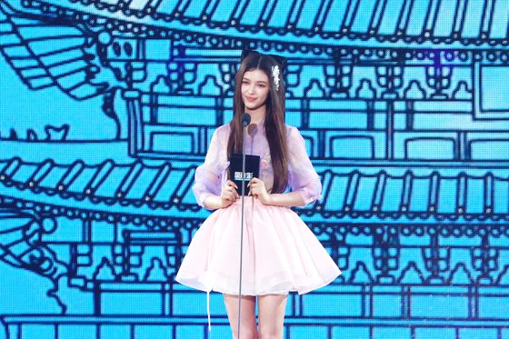 Danielle, switching between English and Korean, served as the presenter of “2024 Korea On Stage — New Generation," event at Gyeongbok Palace's Geunjeongjeon on Tuesday. [YONHAP]  