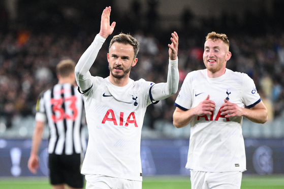 Tottenham Hotspur midfielder James Maddison, left, celebrates scoring a goal during a postseason match against Newcastle United at the Melbourne Cricket Ground in Melbourne, Australia on Wednesday. [EPA/YONHAP] 