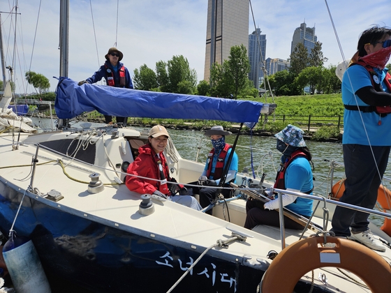 Mary, second from left, is set to set sail with her crew. [SAILING PARADISE]