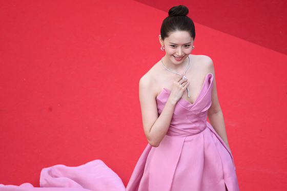 Singer and actor Yoona arrives for the screening of the film ″Horizon: An American Saga″ at the 77th Cannes Film Festival in  France on May 19. [AFP/YONHAP]