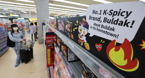 Consumers shop for ramyeon products in a large supermarket in Seoul. Ramyeon emerged as a main export item, with outbound shipments of instant noodles hitting record highs nearly every month entering this year. [NEWS1]