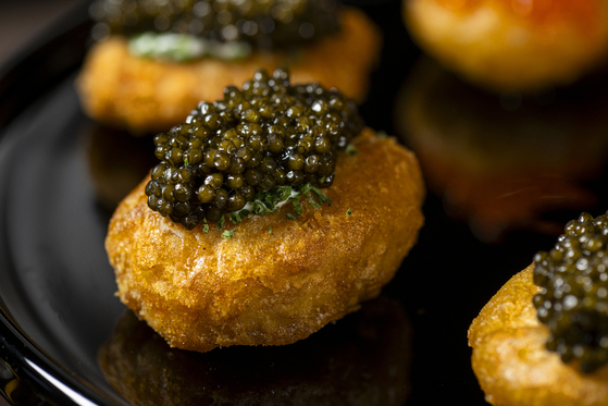 Caviar on chicken at Coqodaq, New York City [COQODAQ]