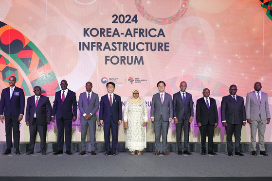 Officials from African nations and Korea pose for a photo during the 2024 Korea-Africa Infrastructure Forum, hosted by the Ministry of Land, Infrastructure, and Transport, on Wednesday at The Westin Chosun in central Seoul. [MINISTRY OF LAND, INFRASTRUCTURE, AND TRANSPORT]