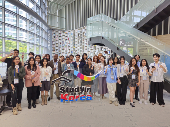 Students selected for this year's Study In Korea Supporters program and representatives of international student associations in Korea pose for a photo at the National Institute of International Education building in Seongnam, Gyeonggi, on Wednesday. [LEE TAE-HEE]