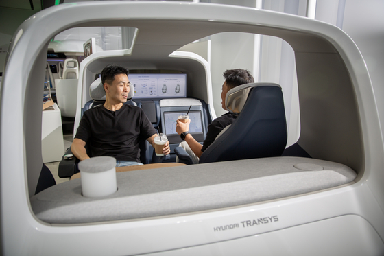Platform Beyond Vehicle concept car where seats can be moved in all directions. [HYUNDAI TRANSYS]
