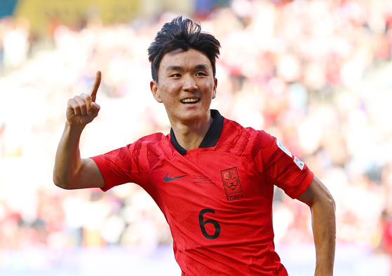Hwang In-beom celebrates after scoring the first goal during a Group E match against Bahrain at the 2023 AFC Asian Cup in Doha, Qatar on Jan. 15. [YONHAP]