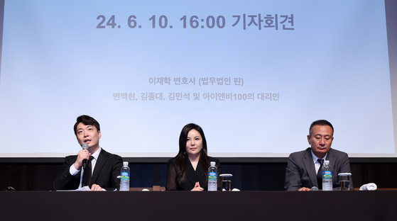 Representatives from INB100, the agency of EXO-CBX members Chen, Baekhyun and Xiumin, speak to reporters in a press conference held on June 10 in central Seoul "declaring full-on war against SM Entertainment." From left are: Lawyer Lee Jae-hak, attorney of the three EXO members and INB100; Cha Ga-won, majority shareholder of One Hundred, the holding company of INB100; and CEO Kim Dong-joon of INB100 and One Hundred. [NEWS1]