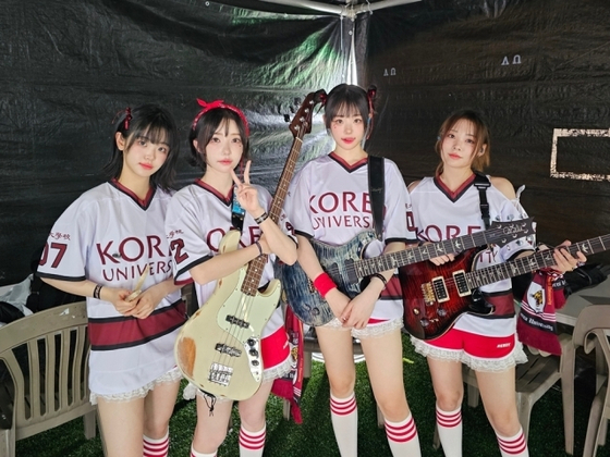 Girl group QWER poses on the day it performed for Korea University's festival on May 25. [TAMAGO PRODUCTION]