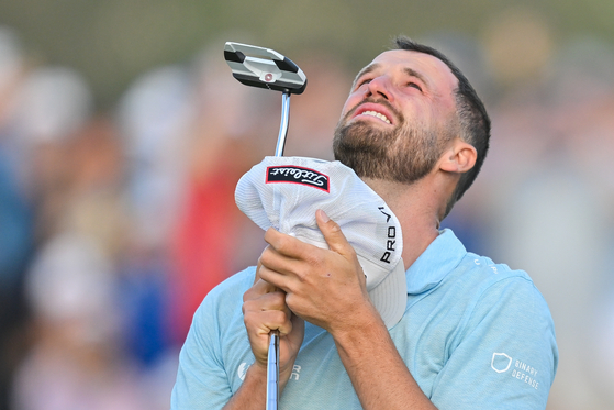 Wyndham Clark reacts to winning on the 18th green during the final round of the 123rd U.S. Open Championship at The Los Angeles Country Club (North Course) in Los Angeles, California on June 18, 2023.  [GETTY IMAGES]