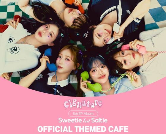 Poster for girl group cignature's pop-up store at the Whosfan Cafe Myeongdong location from Thursday to June 19. [HANTEO GLOBAL]