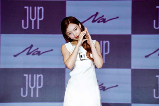 Nayeon makes the letter ″A″ with her hands while posing for the cameras. [DANIELA GONZALEZ PEREZ]