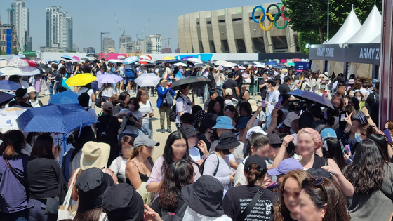 Fans fill the Sports Park at the Seoul Sports Complex in southern Seoul on June 13 at around 11 a.m. for the 2024 Festa, an event celebrating boy band BTS's 11th anniversary of debut. [YOON SO-YEON]