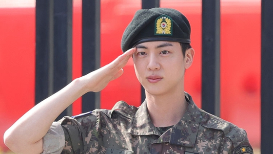 Jin completes his military service and was discharged from the ROK Army 5th Infantry Division Recruit Training Center in Yeoncheon County, Gyeonggi at around 8:30 a.m. on June 12. [YONHAP]