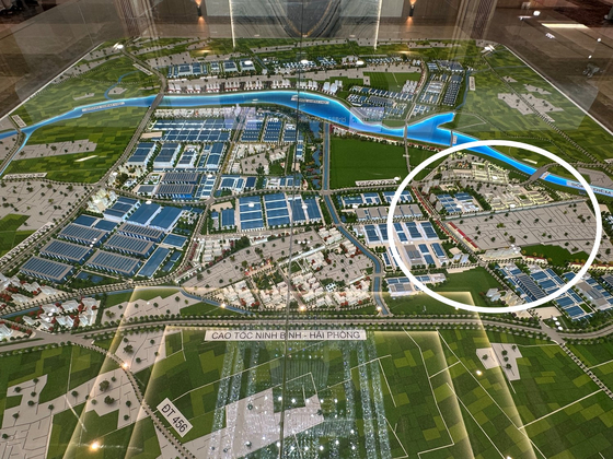 A scale model showcases the prospective site for Hitejinro's overseas factory in the Green iP-1 Industrial Park in the Thai Binh Economic Zone. The highlighted area indicates the planned location for the new facility. [SEO JI-EUN]