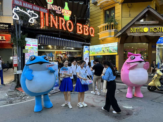 Hitejinro mascots promote the company's soju in Hanoi, Vietnam, on June 10. [SEO JI-EUN] 