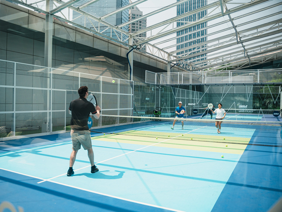 Practice at the Mmove Padel Lounge in Yongsan District, central Seoul. [MMOVE]