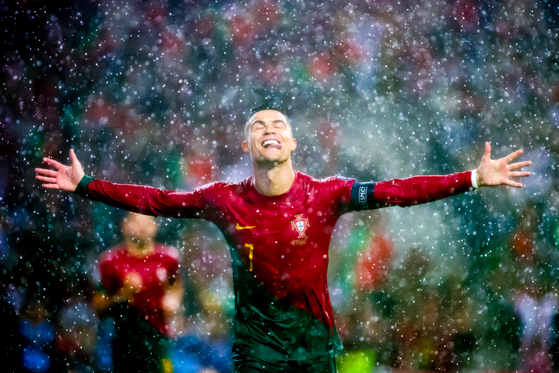 Photographer Marcelo Guelber Goes' image of Cristiano Ronaldo during a Euros qualifier against Slovakia won the Football category at the 2024 World Sports Photography Awards.  [MARCELO GUELBER GOES]