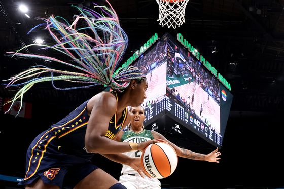 Mercedes Russell of the Seattle Storm defends Aliyah Boston of the Indiana Fever in this photo taken by Steph Chambers at Climate Pledge Arena in Seattle, Washington on June 22, 2023. It won the Basketball category at the 2024 World Sports Photography Awards.  [STEPH CHAMBERS]