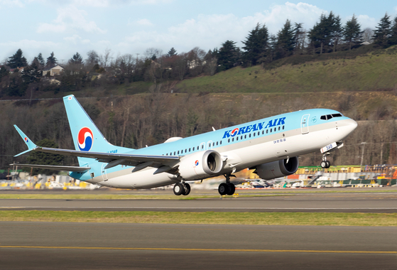 Korean Air's Boeing 737-8 aircraft takes off from a runway [KOREAN AIR]