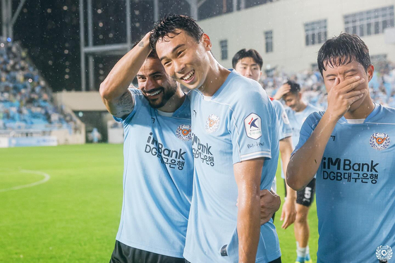 Daegu FC celebrate after winning a K League 1 match over Jeonbuk Hyundai Motors at DGB Daegu Bank Park in Daegu in a photo shared on Daegu FC's official Facebook account on Sunday. [SCREEN CAPTURE]