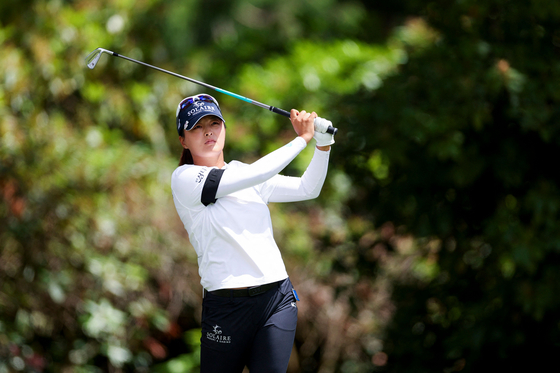 Korea's Ko Jin-young hits a tee shot on the fifth hole during the third round of the KPMG Women's PGA Championship at Sahalee Country Club on Saturday in Sammamish, Washington. [AFP/YONHAP]