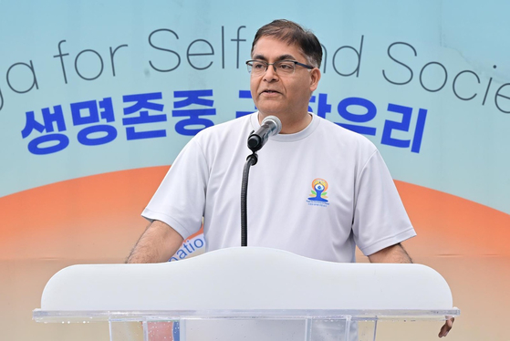 Ambassador of India to Seoul Amit Kumar speaks during the opening ceremony for an event hosted by the Indian Embassy in celebration of the 10th International Day of Yoga at COEX Plaza in Gangnam District, southern Seoul, on Saturday. [EMBASSY OF INDIA]