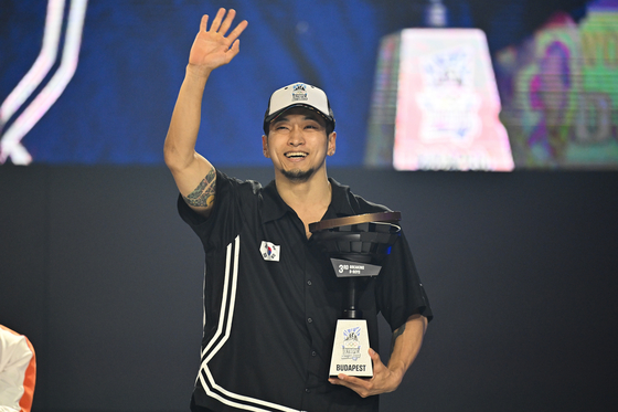 Korea's Hong 10 poses during a victory ceremony at the 2024 Olympic Qualifier Series in Budapest, Hungary on Sunday. [AP/YONHAP]