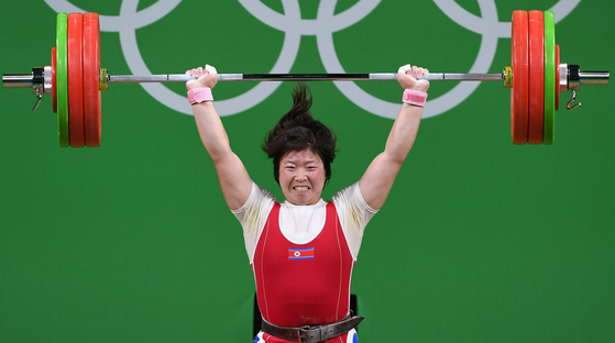 North Korean weightlifter Rim Jong-sim competes during the women's 75 kilogram final at the 2016 Rio Olympic Games in Rio de Janeiro, Brazil, on Aug. 12, 2016. [XINHUA/YONHAP]