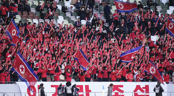 Members of the General Association of Korean Residents in Japan support North Korea during a Paris Olympic qualifer against Japan at the Japan National Stadium in Tokyo, Japan on Feb. 28. [YONHAP] 