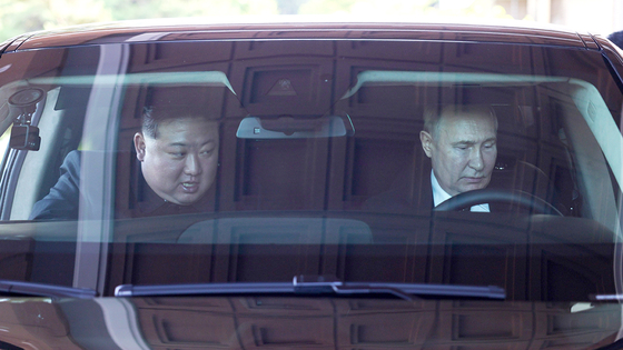 North Korean leader Kim Jong-un and Russian President Vladimir Putin take a ride in a vehicle during Putin's visit to Pyongyang on June 19. [YONHAP]
