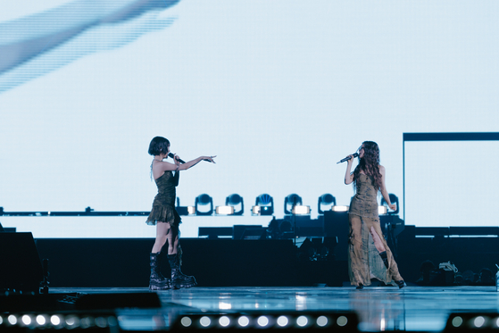 Members Hanni and Danielle of girl group NewJeans performing at the quintet's first meet and greet in Japan, the ″Bunnies Camp 2024 Tokyo Dome,″ which took place on June 26 and 27 at the Tokyo Dome, Japan [ADOR]