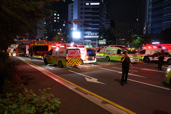 First responders are clearing the scene of a fatal car accident near Seoul City Hall in downtown Seoul late Monday. [NEWS1]