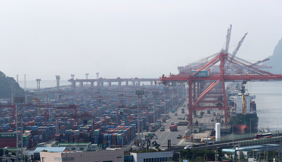 Containers are stacked at a port in the southeastern city of Busan on Monday. [NEWS1]