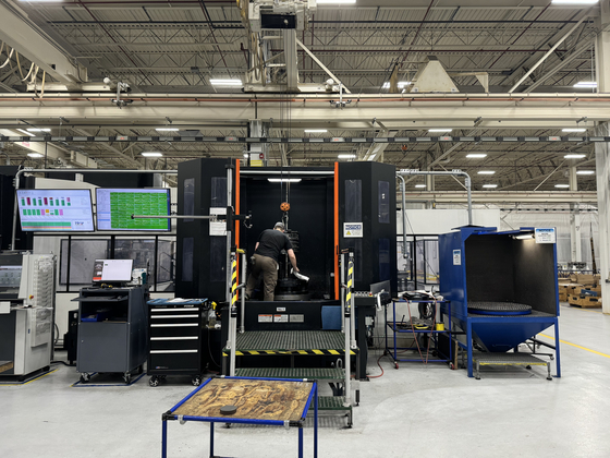 A Hanwha Aerospace USA worker produces cases, critical parts for aircraft engines, at the company's manufacturing facility in Cheshire, Connecticut on June 25. [HANWHA AEROSPACE USA] 