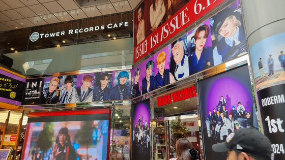 The walls of Shibuya's Tower Records showing members of boy band INI on June 25 [YOON SO-YEON]