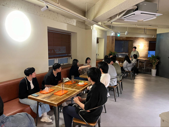 A meeting hosted by Busan Korea-Japan Exchange Meeting Uni-One at Cafe Banker in Busanjin District, Busan in May. [LEE SOO-HYUN] 